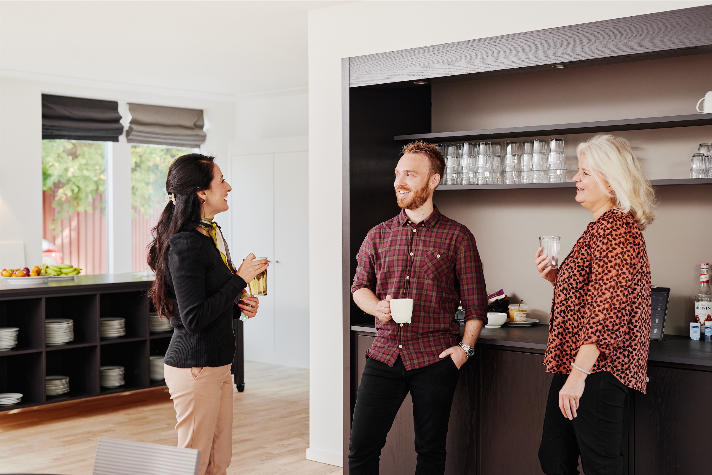 Chr. Olesen's colleauges having a coffee break at the office in Denmark